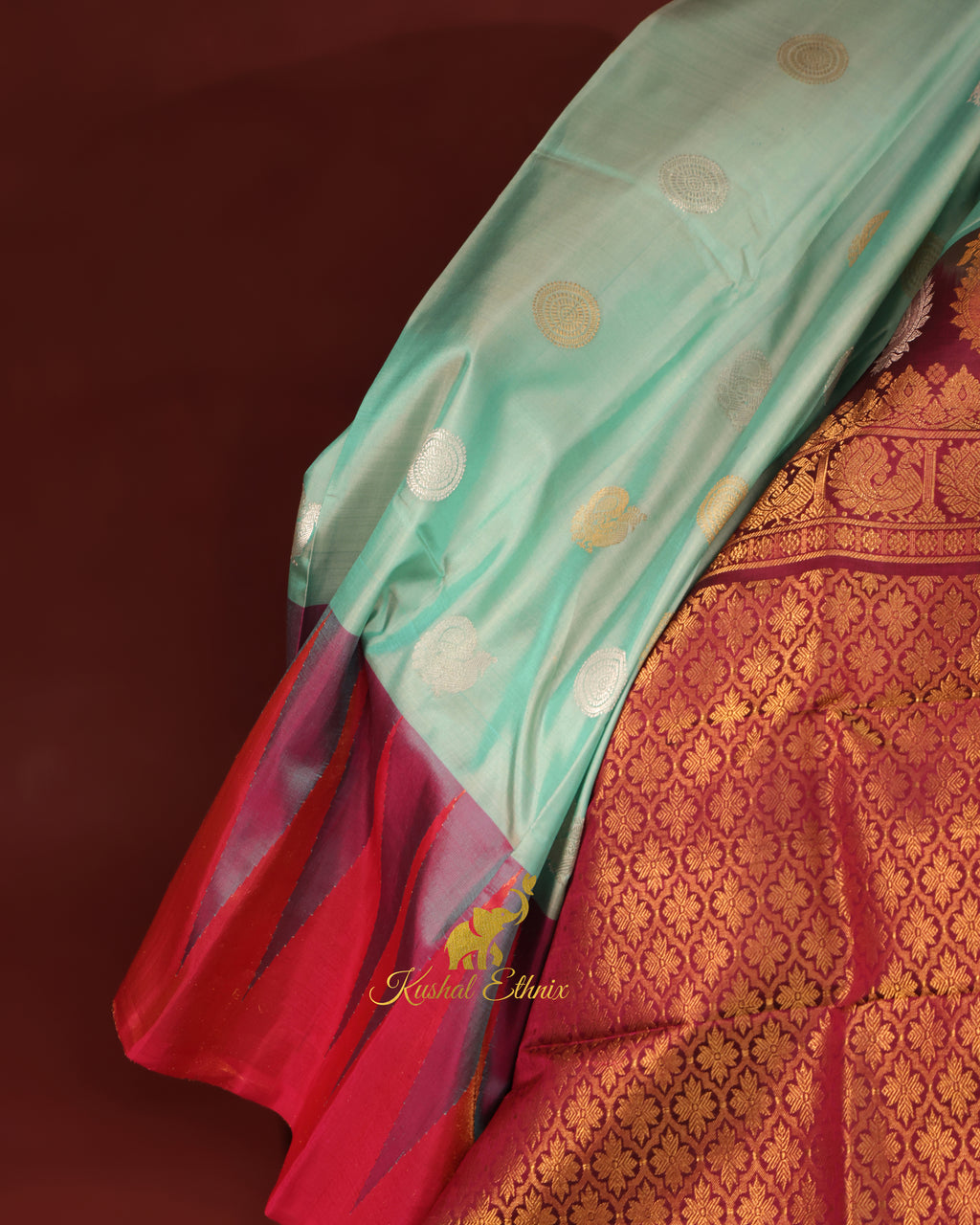 Mint Green Gadwal Silk Saree with Tissue Temple Border