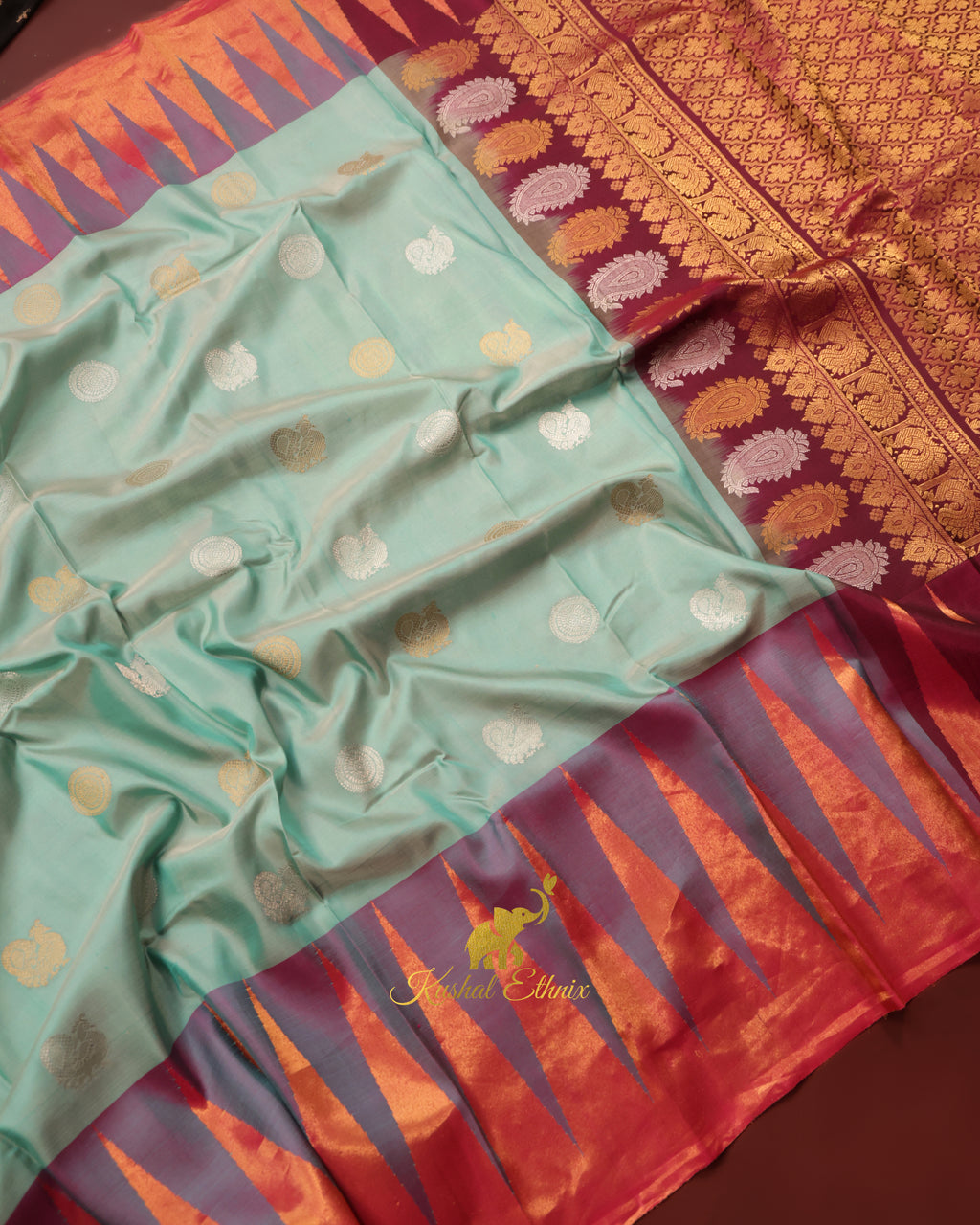 Mint Green Gadwal Silk Saree with Tissue Temple Border