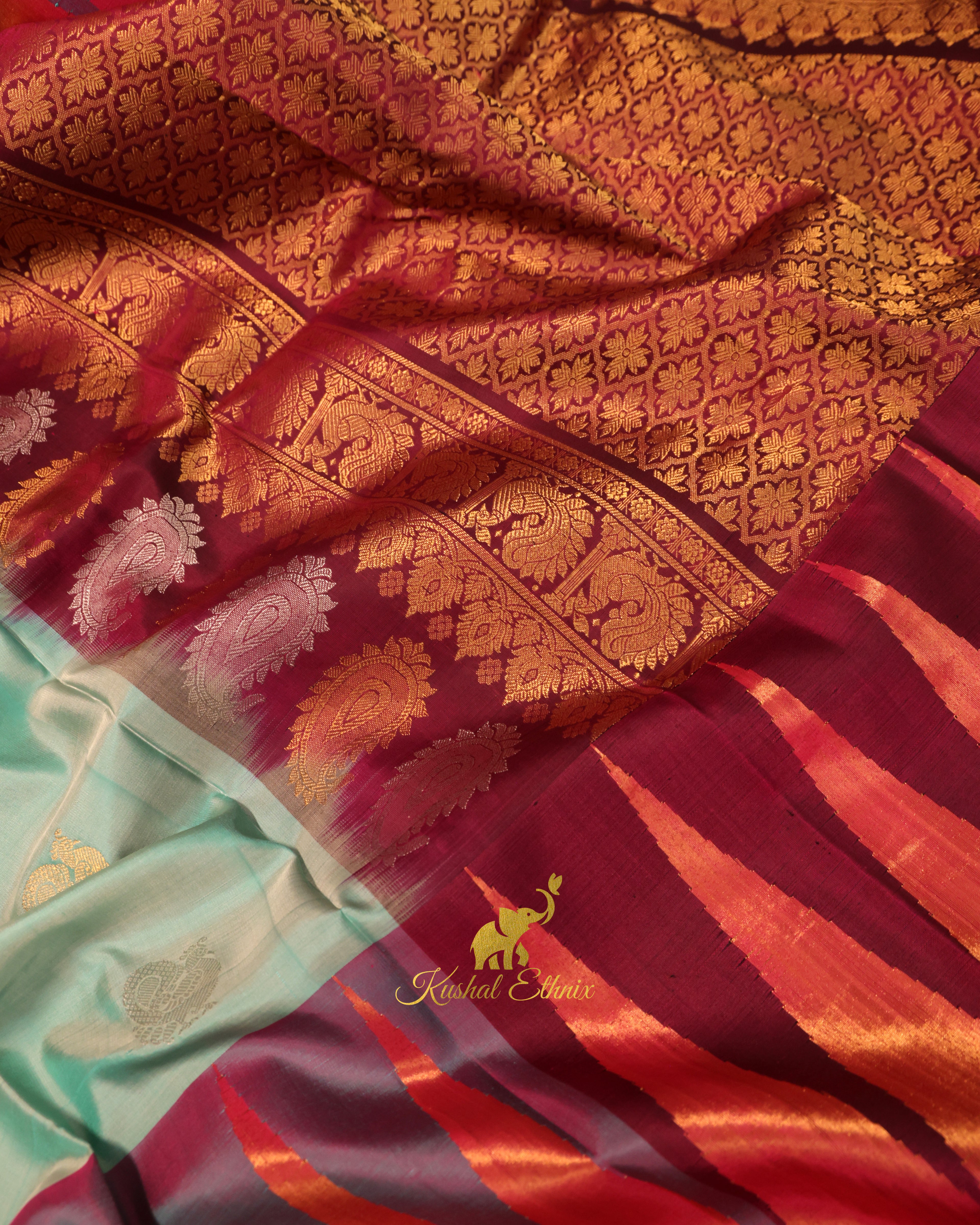 Mint Green Gadwal Silk Saree with Tissue Temple Border