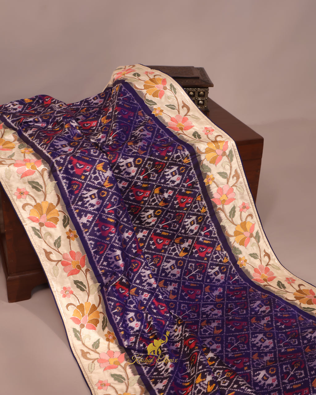 Navy Blue Ikkat Saree with Floral Embroidered Border