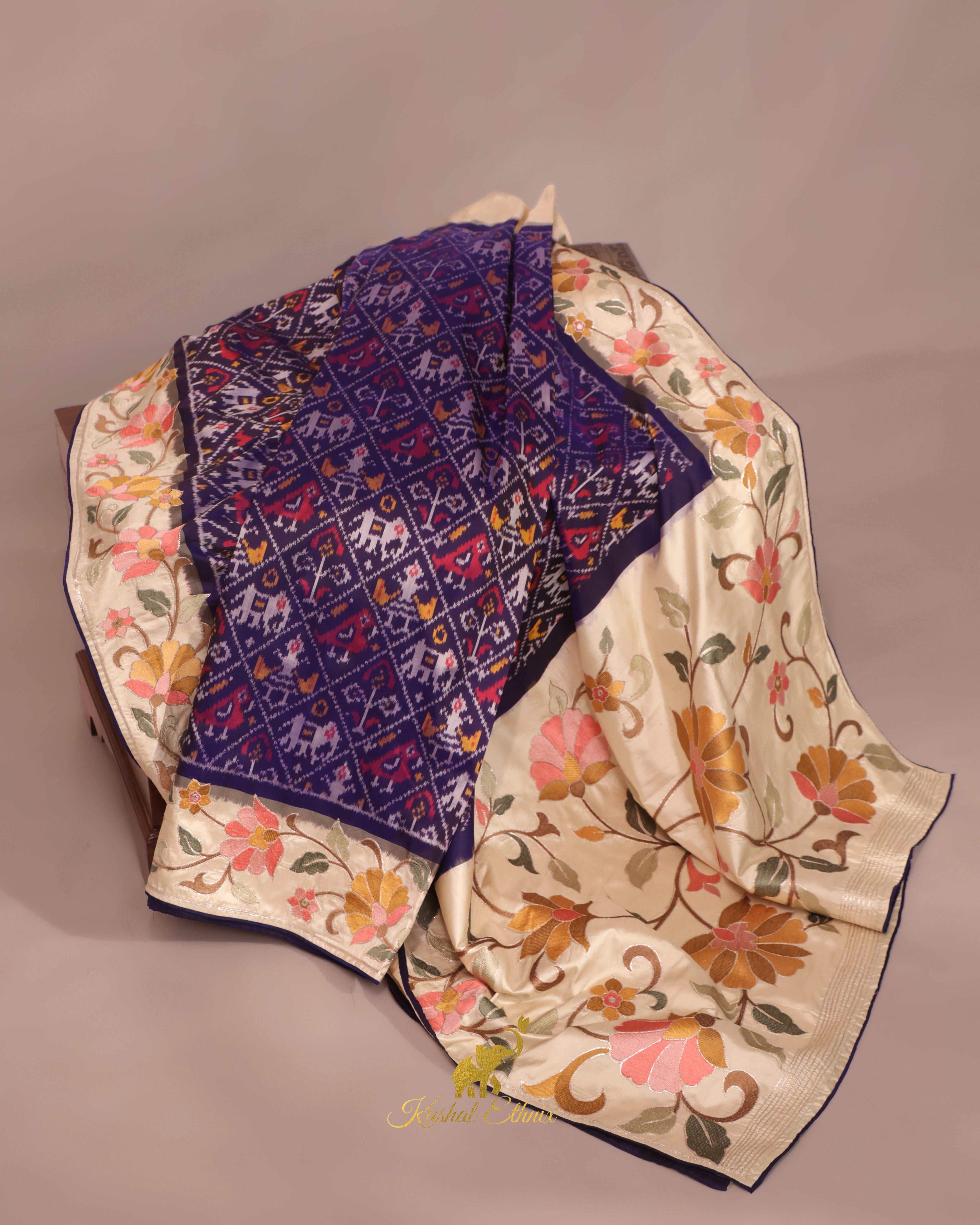Navy Blue Ikkat Saree with Floral Embroidered Border