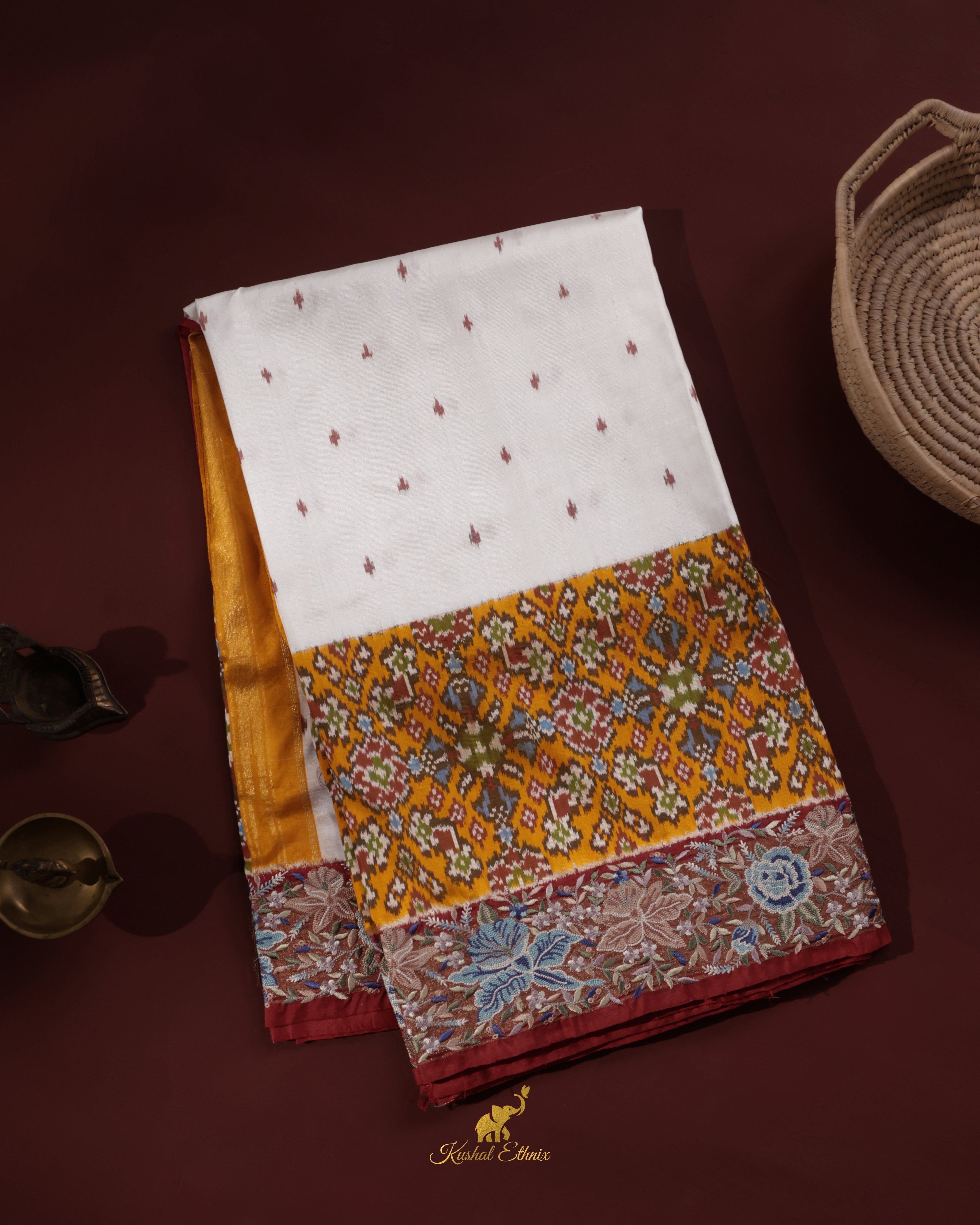 White & Yellow Ikkat Saree with Petit Point Work