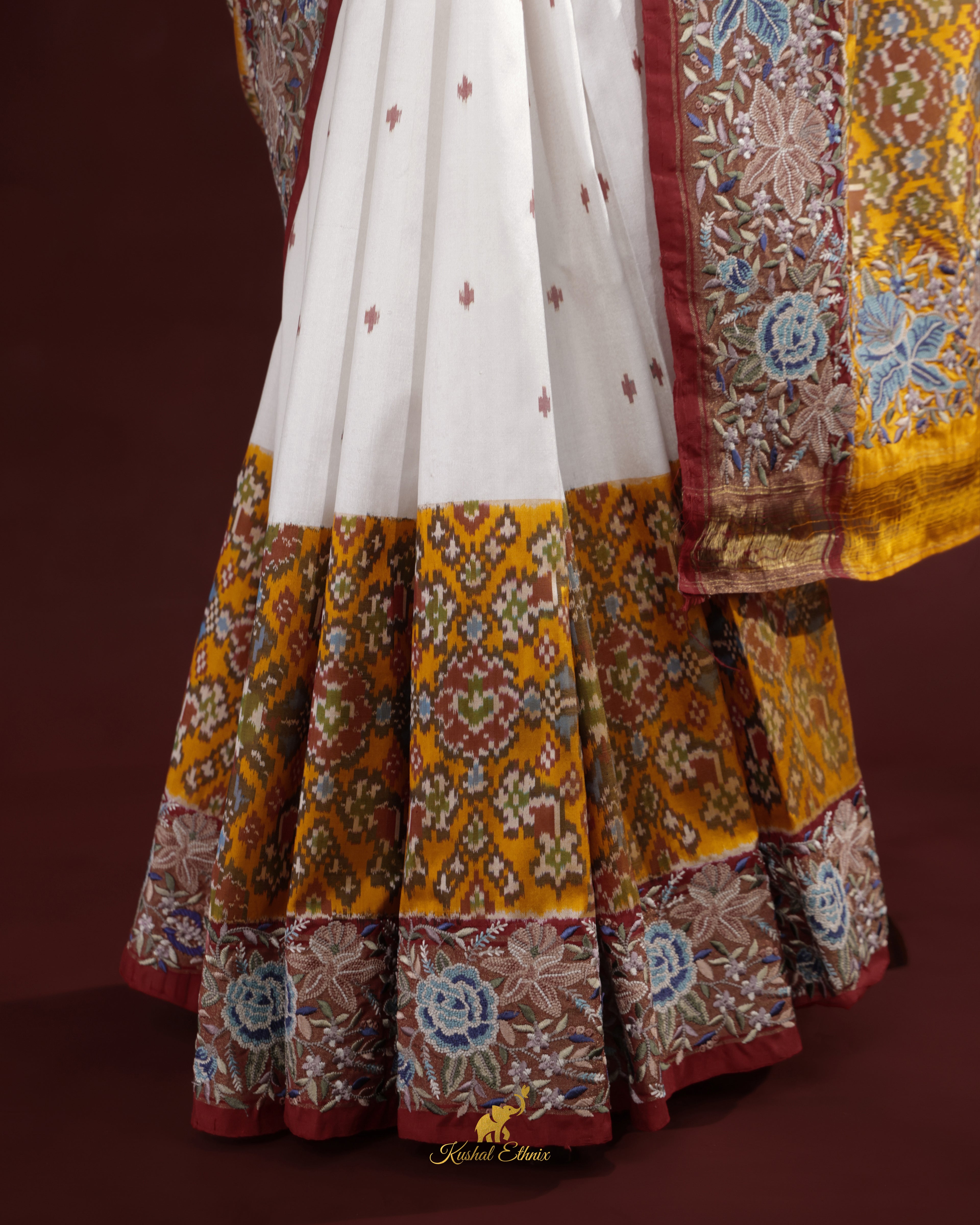 White & Yellow Ikkat Saree with Petit Point Work