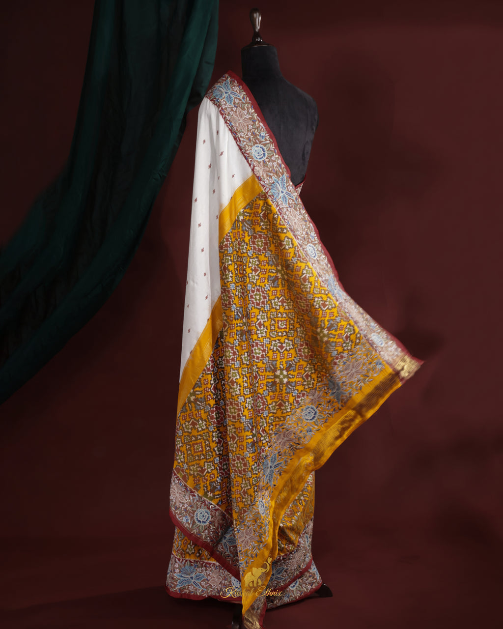 White & Yellow Ikkat Saree with Petit Point Work