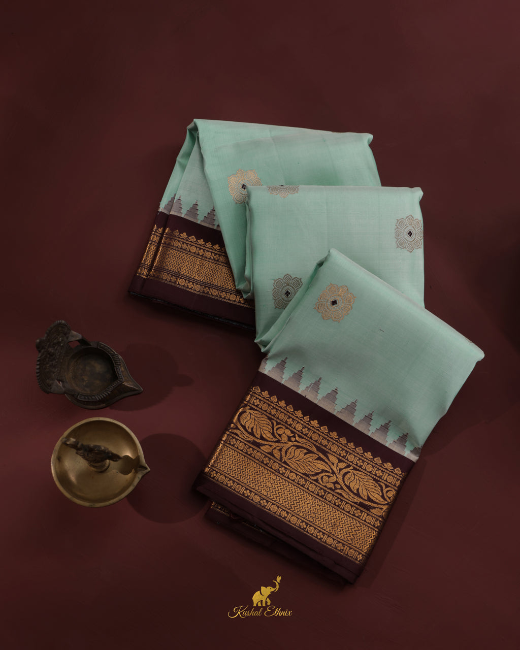 Mint Green Gadwal Pattu Saree with Temple Border