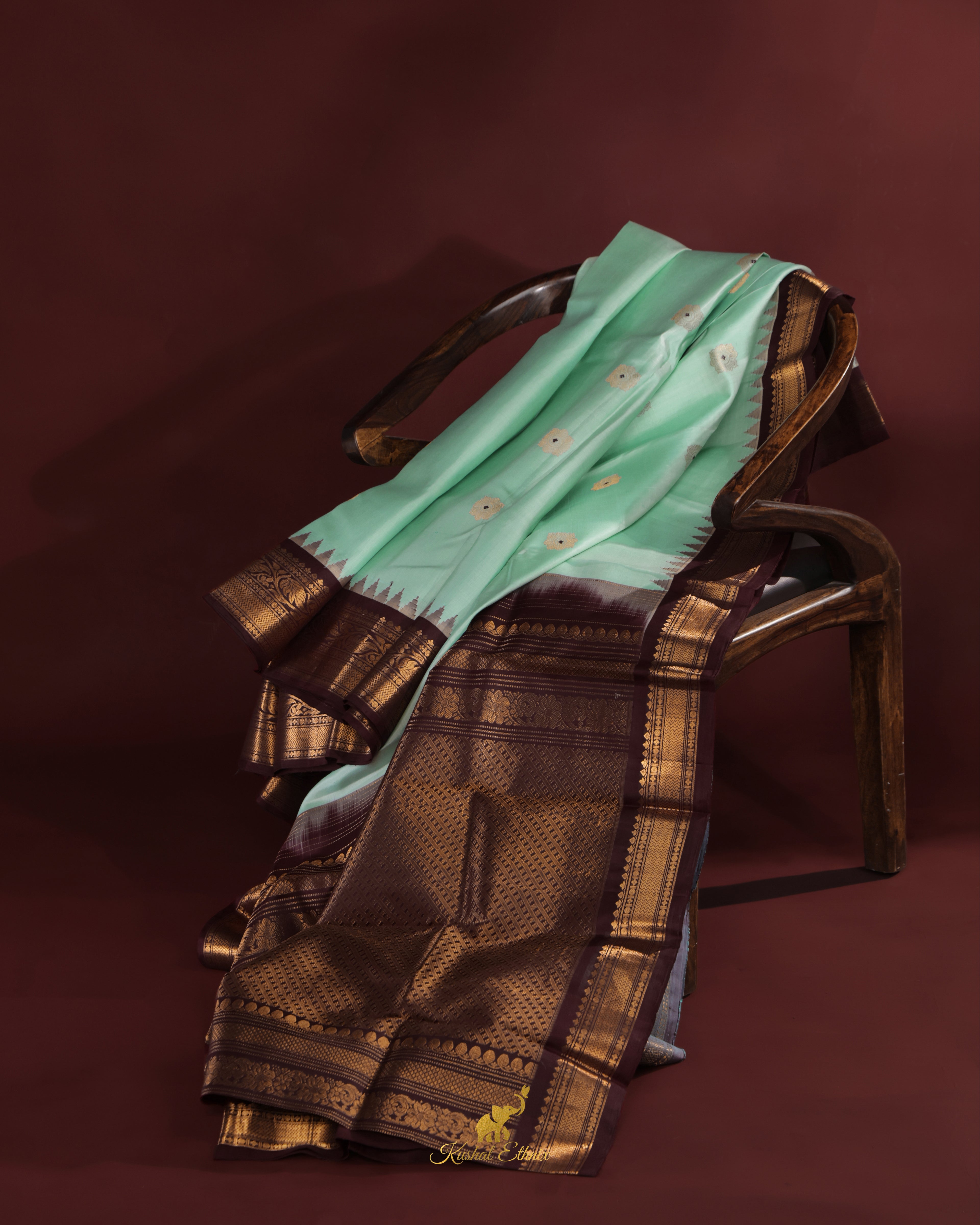 Mint Green Gadwal Pattu Saree with Temple Border