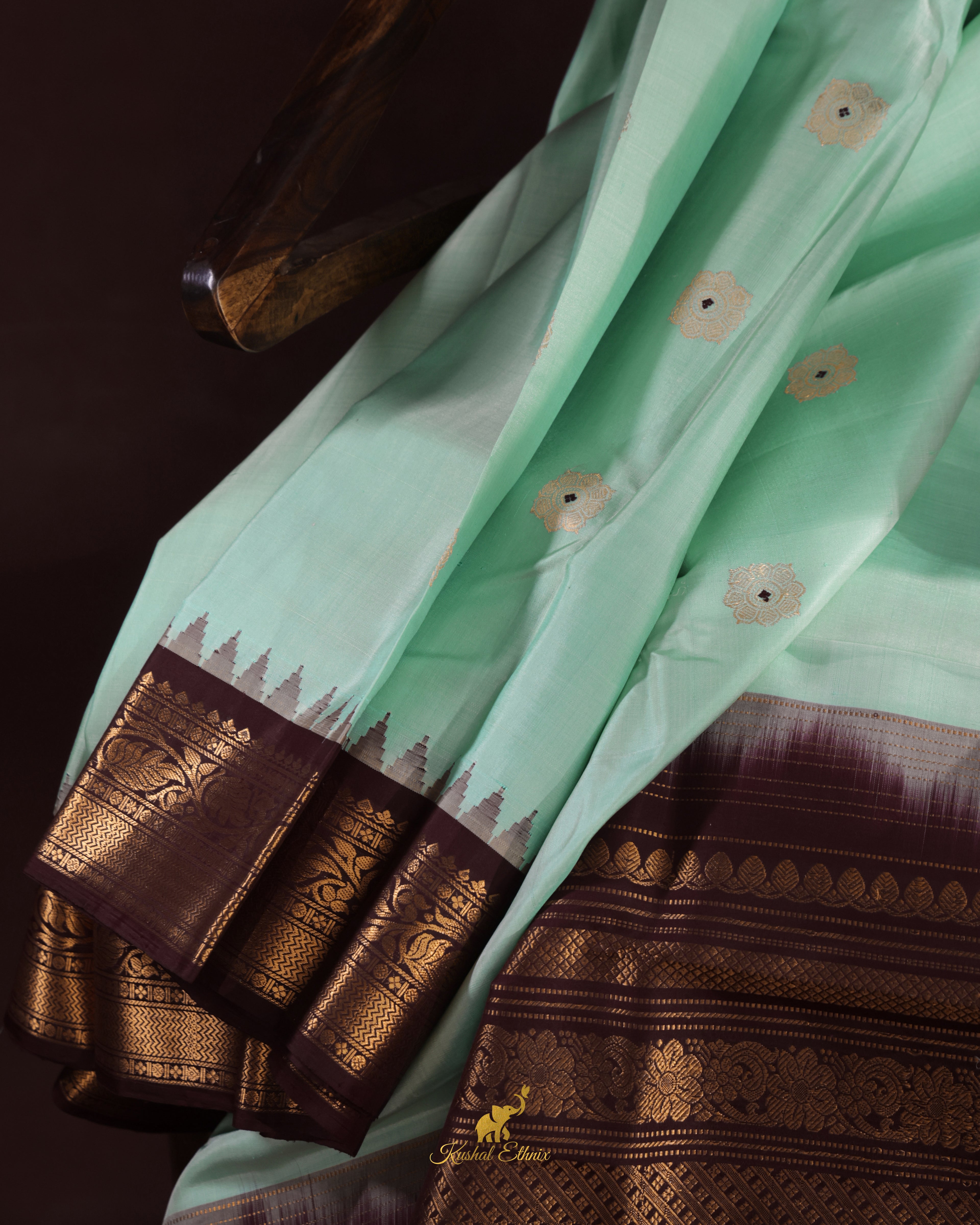 Mint Green Gadwal Pattu Saree with Temple Border