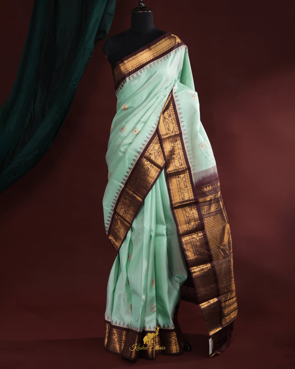 Mint Green Gadwal Pattu Saree with Temple Border