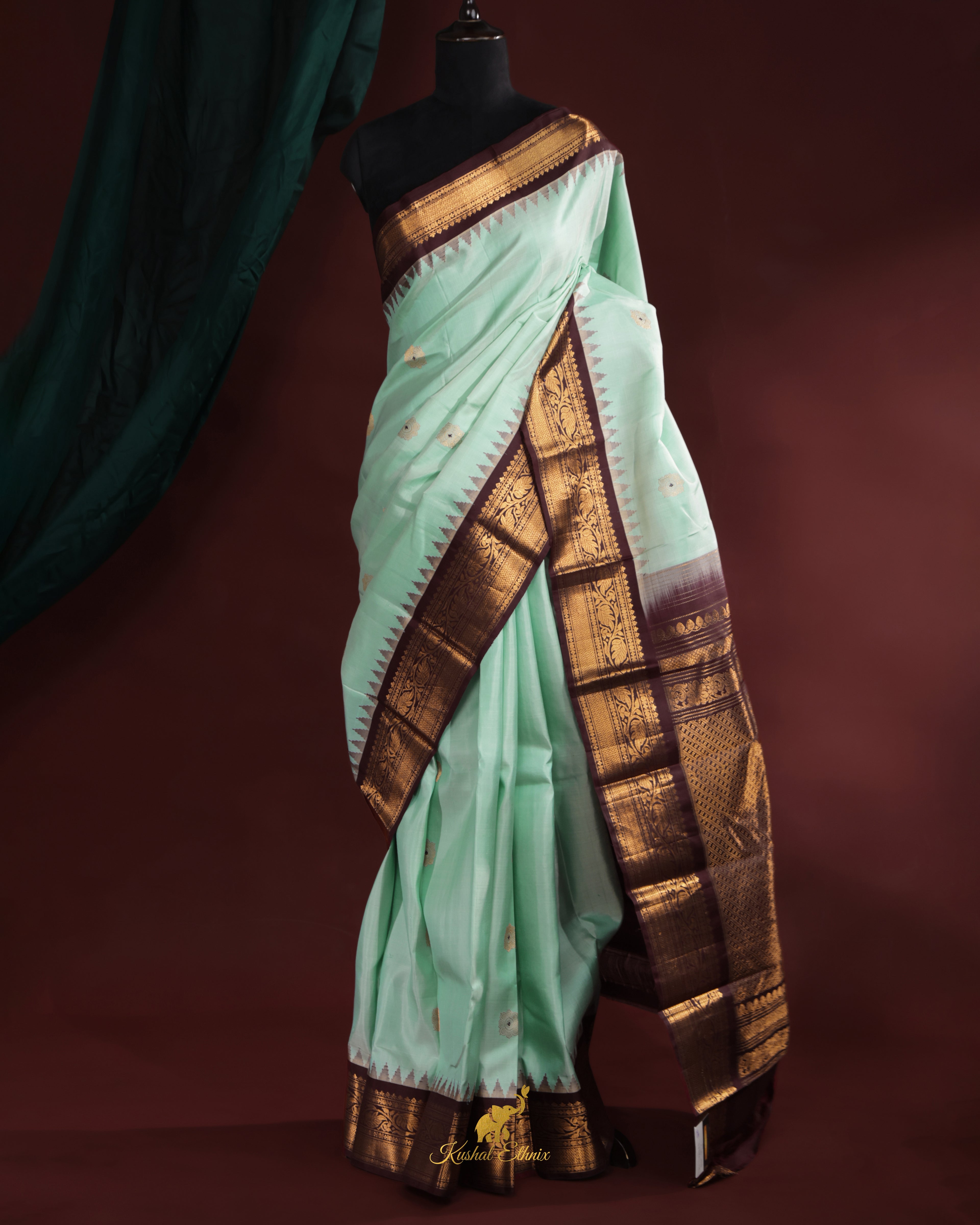 Mint Green Gadwal Pattu Saree with Temple Border