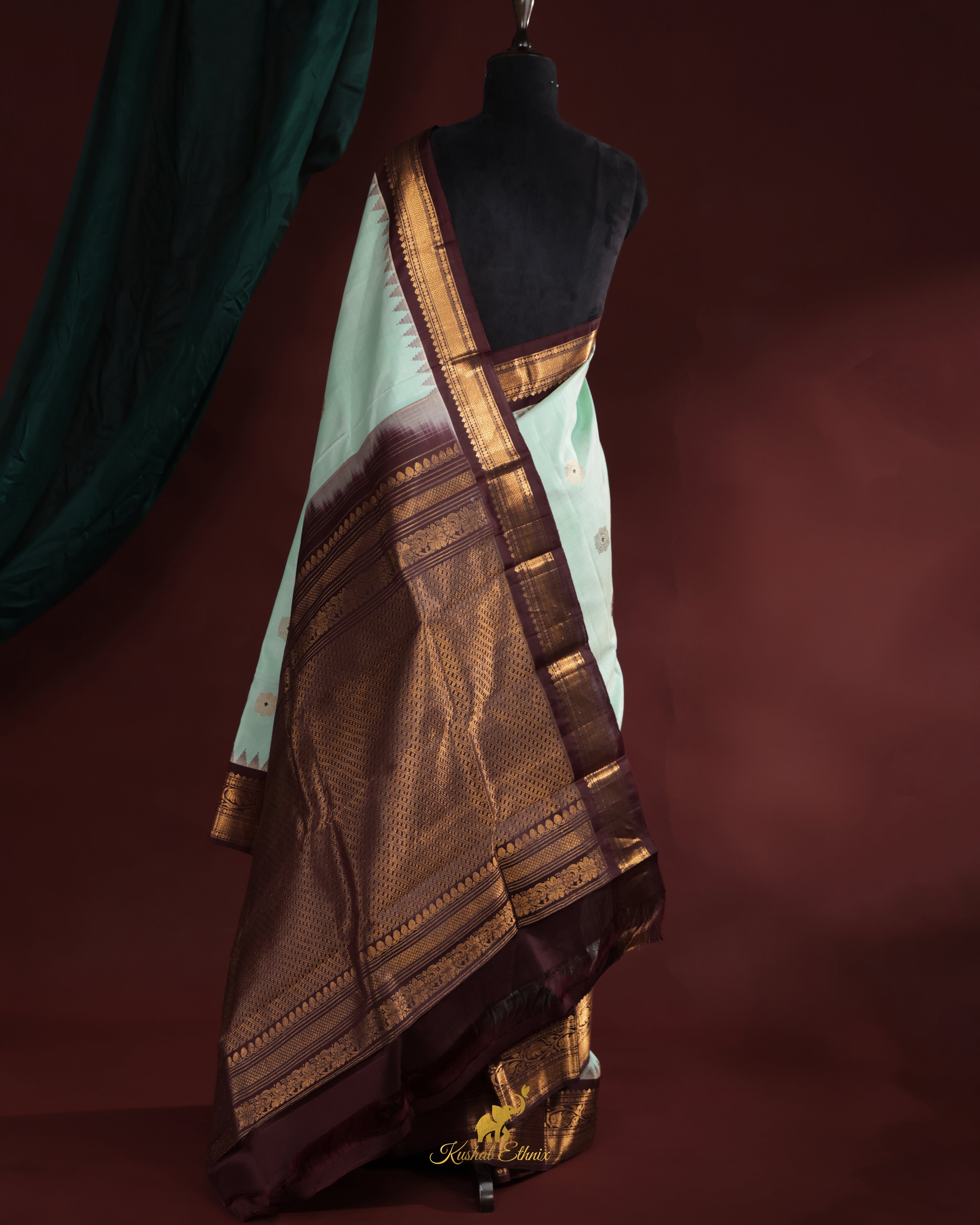 Mint Green Gadwal Pattu Saree with Temple Border