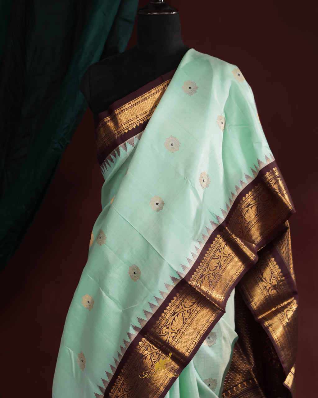 Mint Green Gadwal Pattu Saree with Temple Border