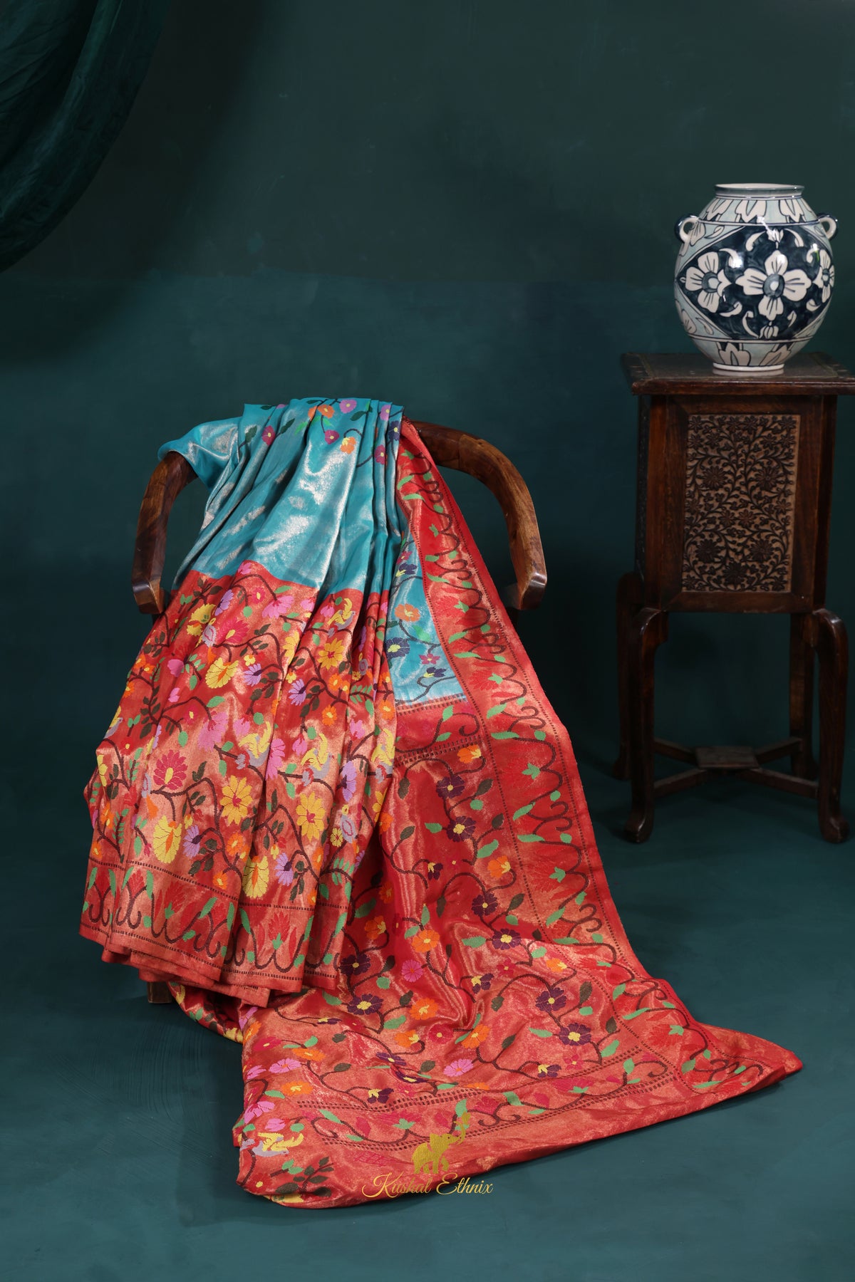4-Ply Zari Kota Saree – Coral Red & Sky Blue Floral Elegance