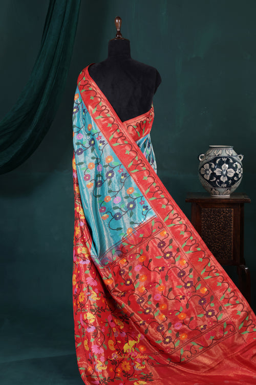 4-Ply Zari Kota Saree – Coral Red & Sky Blue Floral Elegance